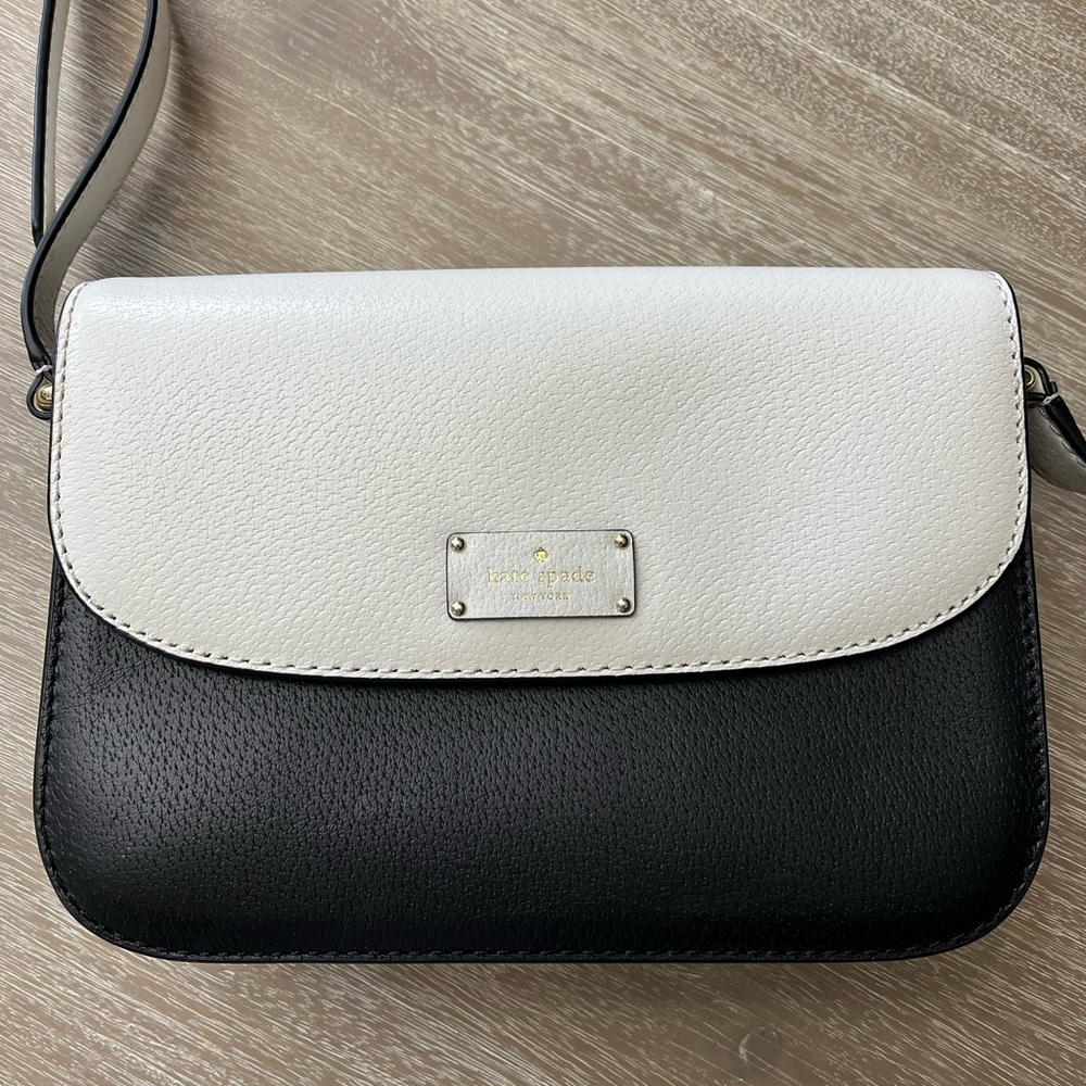 Authentic Kate Spade black and white leather shoulder or crossbody bag.